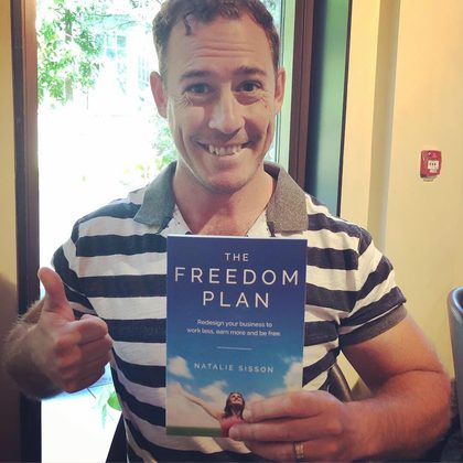 Reader holding The Freedom Plan (3)