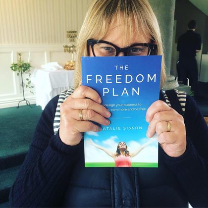 Reader holding The Freedom Plan (5)